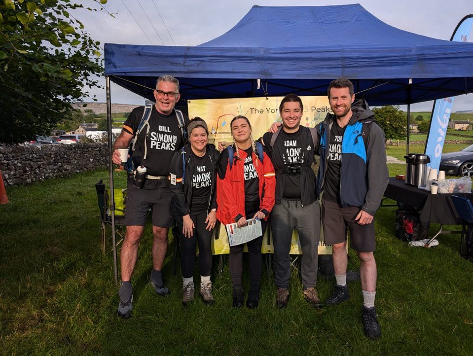 5 walkers preparing for the start of the Yorkshire 3 Peaks Challenge